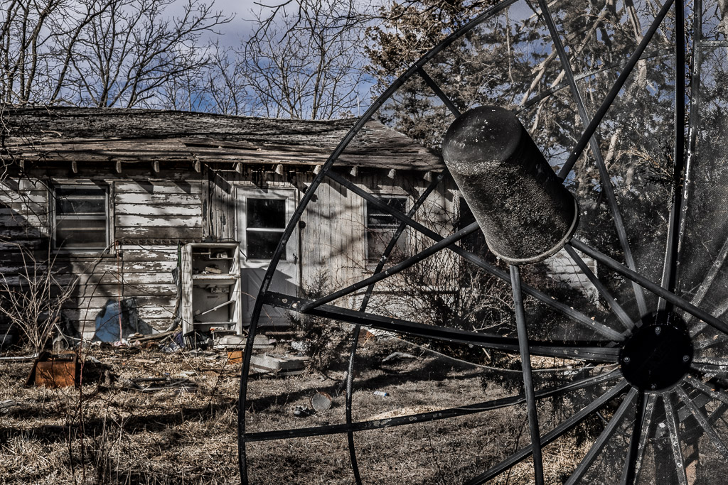 It's a shack, but it had old-school satellite.  More rural abandonment in Iowa.