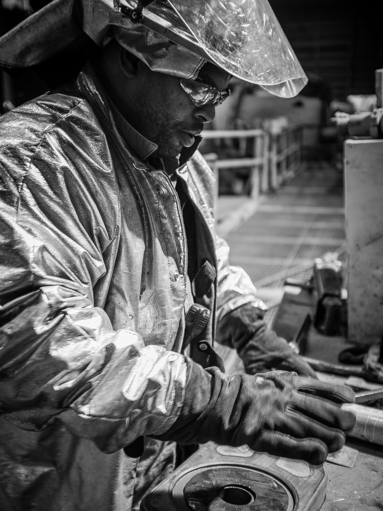 A workman prepares the critical ladle gate and nozzle which allow the steel to be drawn from the bottom of the ladle and rate of flow to be controlled.

So, it's over.

The steel mill where I've worked for 22 years has closed the 