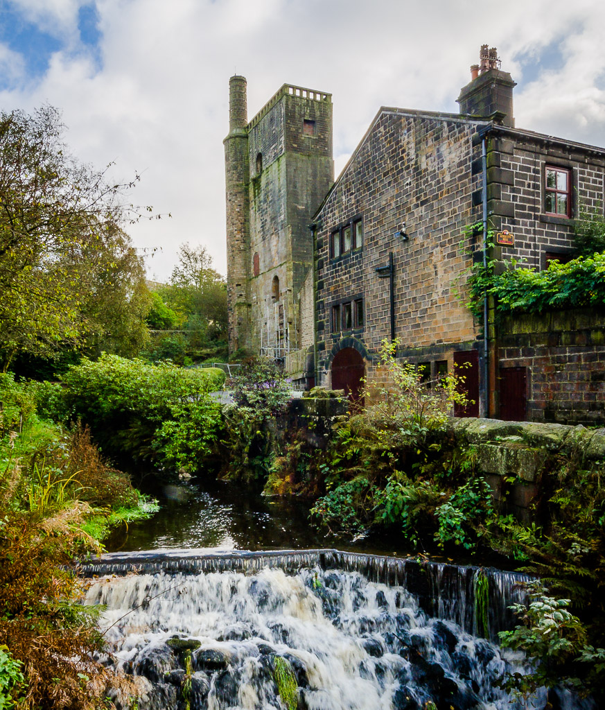 Lumbutts is an old mill village on the hills above Todmorden.  The big tower used to hold vertically stacked water wheels with one mill dropping water down on the next.  A now-demolished aerial sluice brought water to the top of the tower from a pond higher up the slope.